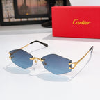 Sunglasses with gold metal frame, blue tinted lenses, black temple arms