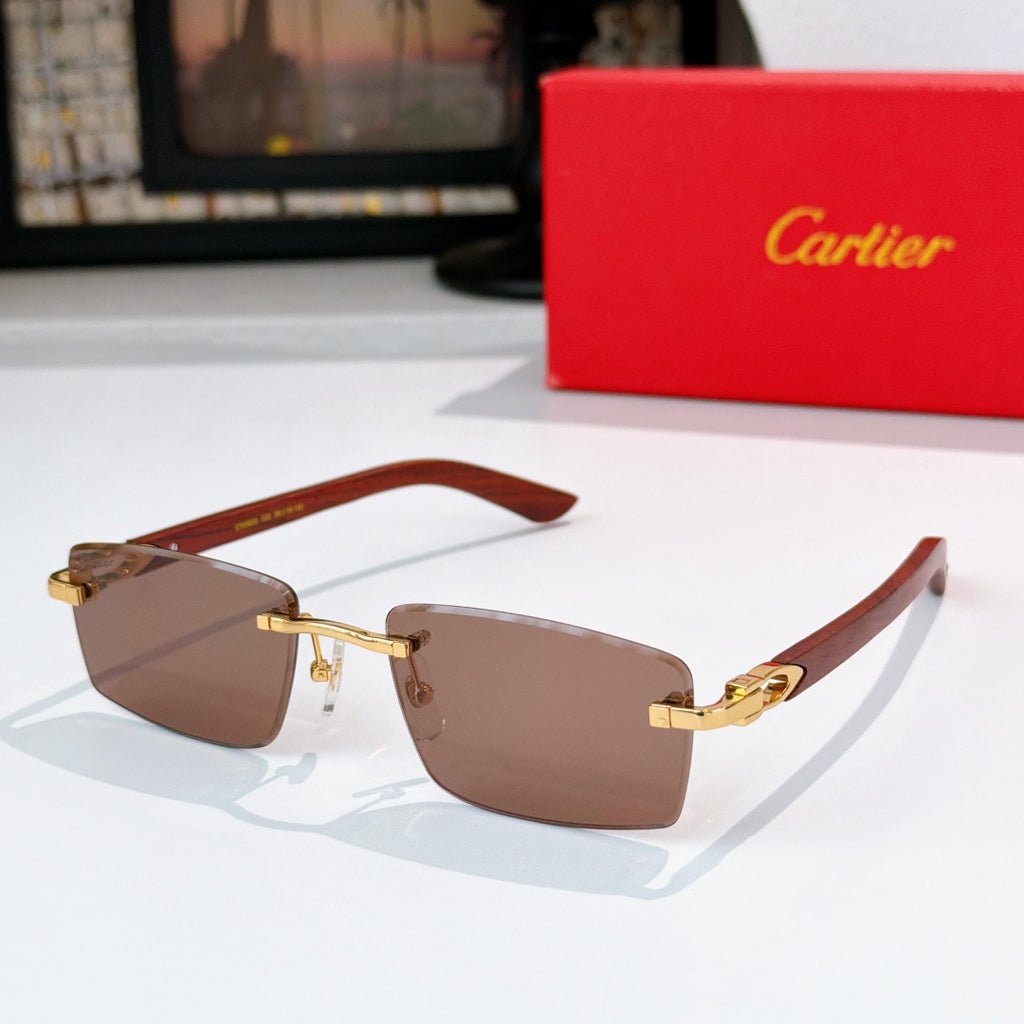 Cartier sunglasses with brown lenses and brown temple arms, gold-tone metal frame
