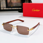 Cartier sunglasses with brown lenses and brown temple arms, gold-tone metal frame