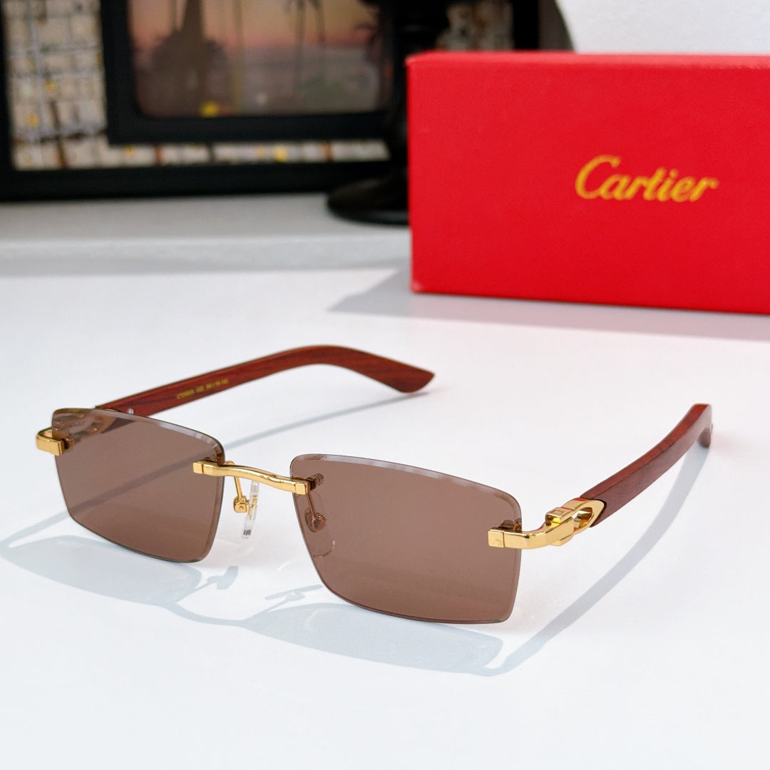 Cartier sunglasses with brown lenses and brown temple arms, gold-tone metal frame