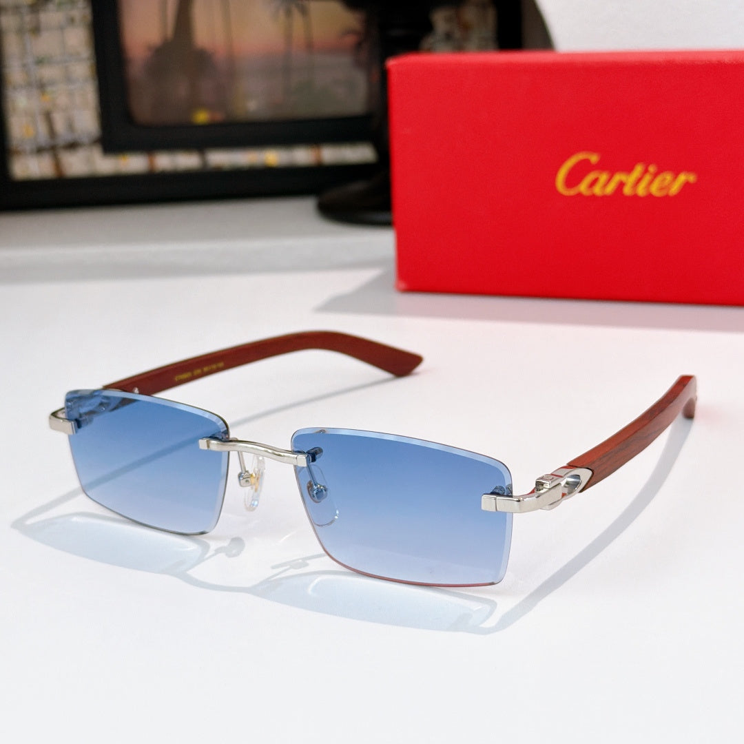 Cartier sunglasses with blue lenses and brown temple arms, gold-tone metal frame
