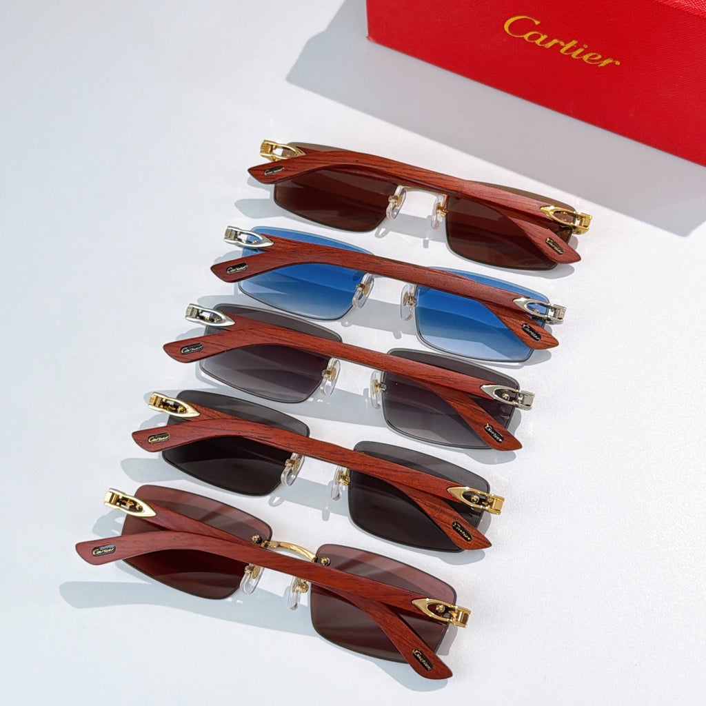 Set of Cartier sunglasses with brown lenses, brown temple arms, gold-tone metal frames