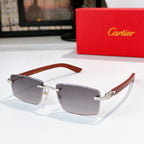 Cartier sunglasses with dark gray lenses and brown temple arms, gold-tone metal frame