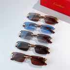 Set of Cartier sunglasses with blue and dark lenses, brown temple arms, gold-tone metal frames