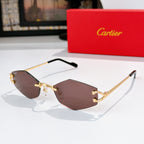 Gold-tone half-rim sunglasses with brown tint lenses and black temple tips