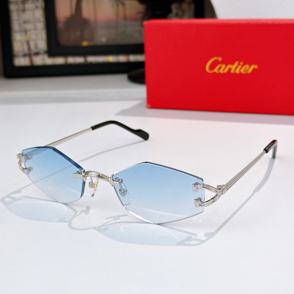 Gold-tone half-rim sunglasses with pale blue tint lenses and black temple tips