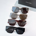 Prada sunglasses assortment with mixed frames and tinted lenses, multiple pairs