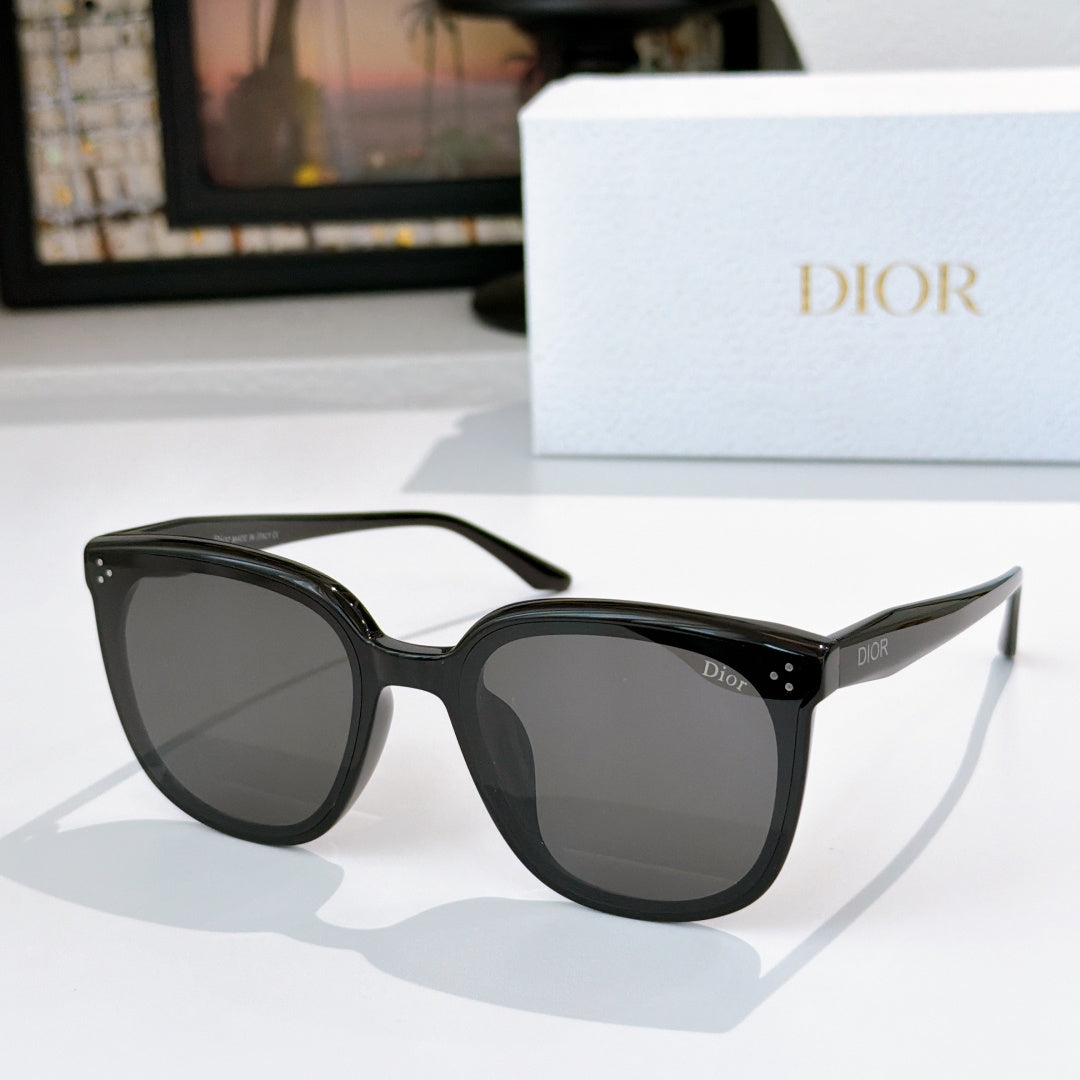 Dior cat-eye sunglasses with black frame and dark lenses