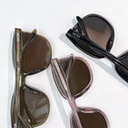 Dior sunglasses set with olive, rose, and black frames and tinted lenses