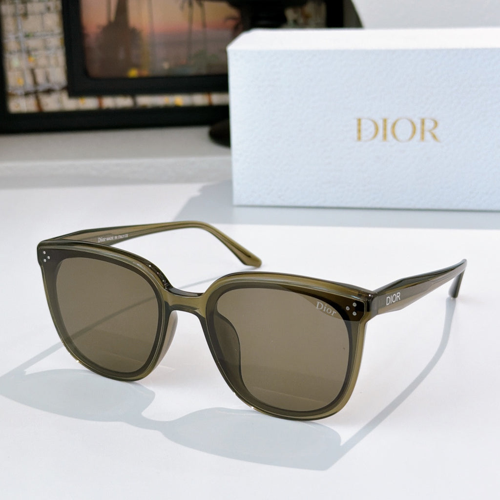 Dior cat-eye sunglasses with olive green frame and dark brown tinted lenses