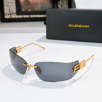 Sunglasses with dark blue lenses and gold metal frame, logo panel on temples
