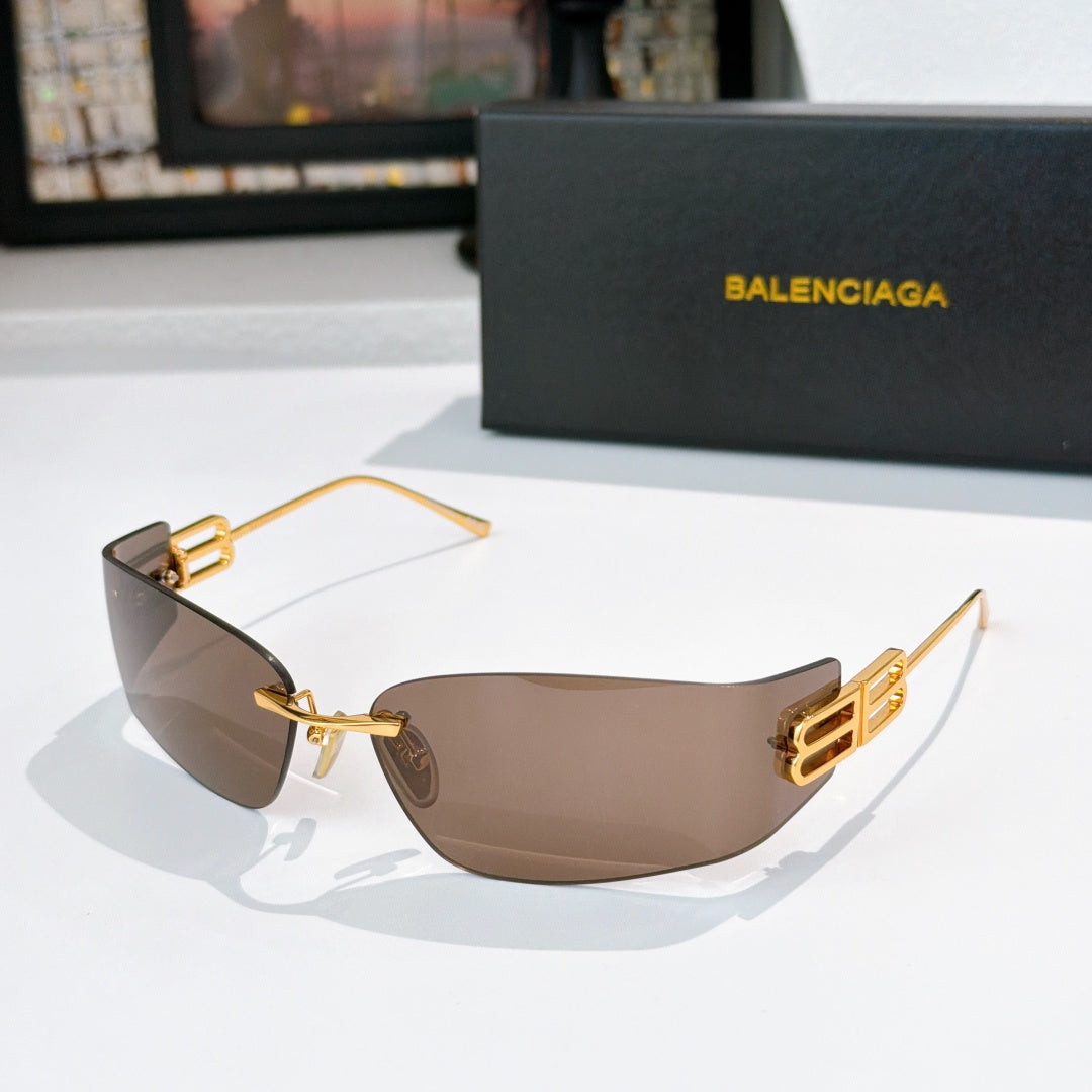 Sunglasses with taupe-brown lenses and gold metal frame, logo panel on arms