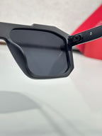 Prada sunglasses side with logo rivet and dark matte frame
