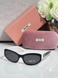 Black sunglasses with dark lenses; pink hard case and purple pouch included