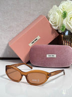 Brown sunglasses with tinted lenses; pink hard case and purple glasses pouch