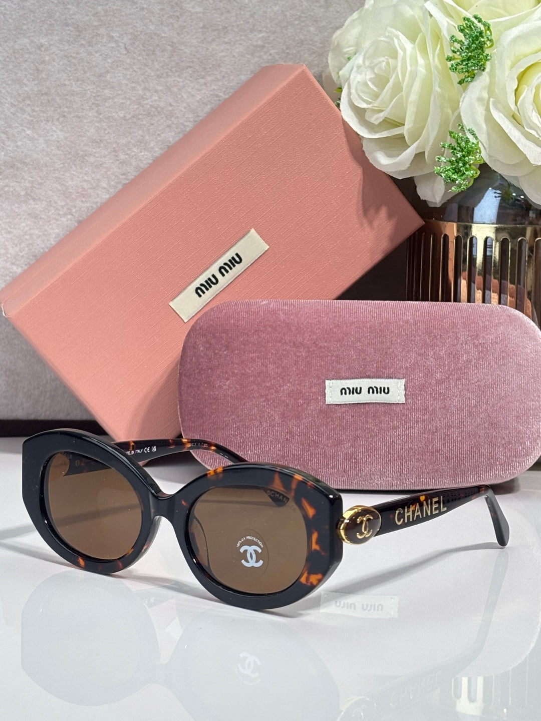 Chanel round sunglasses, dark tortoiseshell frame with brown tinted lenses