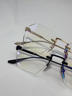 Assorted metal eyeglasses with clear lenses, gold and black frames shown
