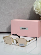 Gold-tone square sunglasses with light amber lenses and black temple tips