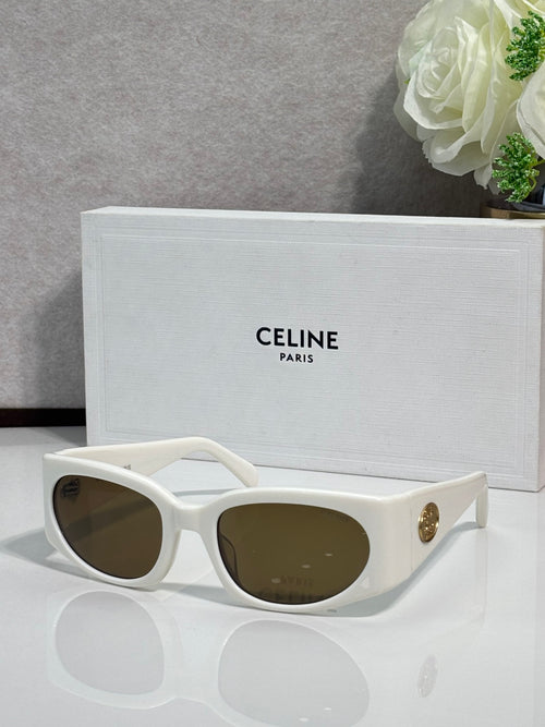 Celine sunglasses, white frame with dark brown oval lenses and gold temple logo