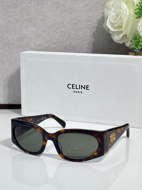 Celine sunglasses, tortoiseshell frame with dark brown oval lenses and gold logo