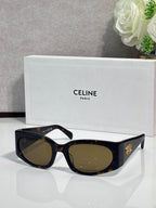 Celine sunglasses, dark tortoiseshell frame with amber oval lenses and gold logo