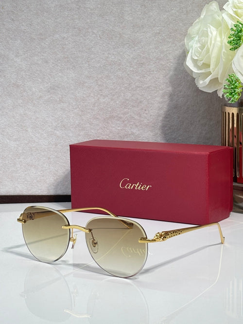 Cartier sunglasses with gold-tone frame and light brown gradient lenses