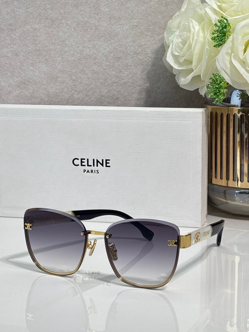 Celine sunglasses, dark lenses, gold-tone frame with branded temple detail