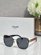 Celine sunglasses, dark blue gradient lenses, gold-tone cat-eye frame