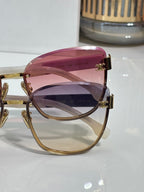 Celine sunglasses, close-up, pink gradient lenses, gold-tone and clear temples