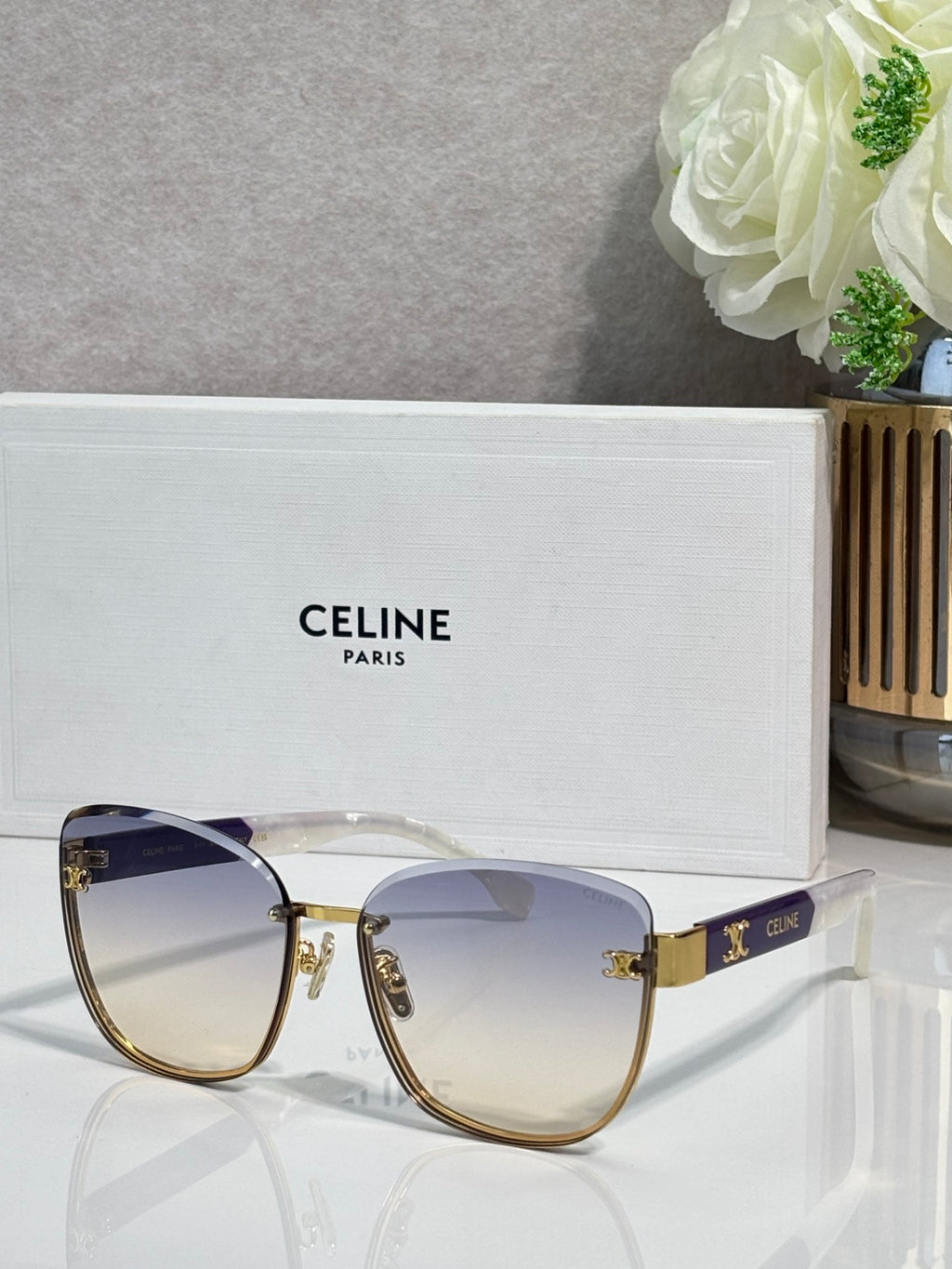 Celine sunglasses, pale gradient lenses, gold-tone frame with dark temple tips