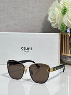Celine sunglasses, dark brown gradient lenses, gold-tone cat-eye frame