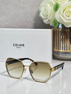 Celine sunglasses with light amber-tinted lenses and gold-tone frame, rounded square