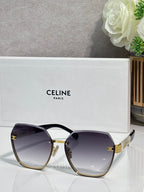 Celine sunglasses with dark-tinted lenses and gold-tone frame, rounded square