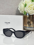 Celine black sunglasses with rounded frames and dark lenses