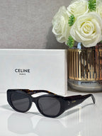 Celine dark tortoiseshell sunglasses with rounded frames and dark lenses