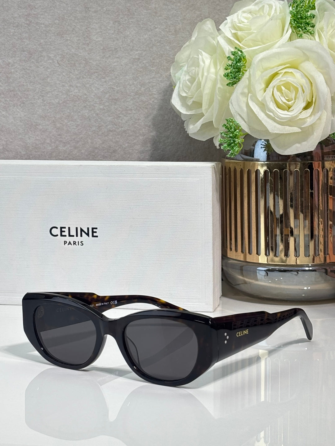 Celine dark tortoiseshell sunglasses with rounded frames and dark lenses