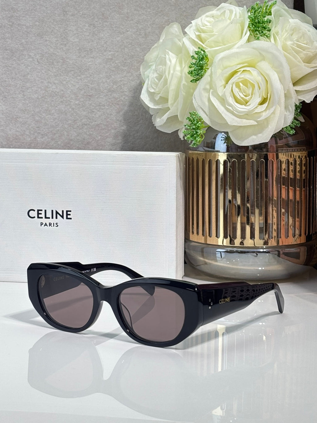 Celine black sunglasses with rounded frames and dark lenses