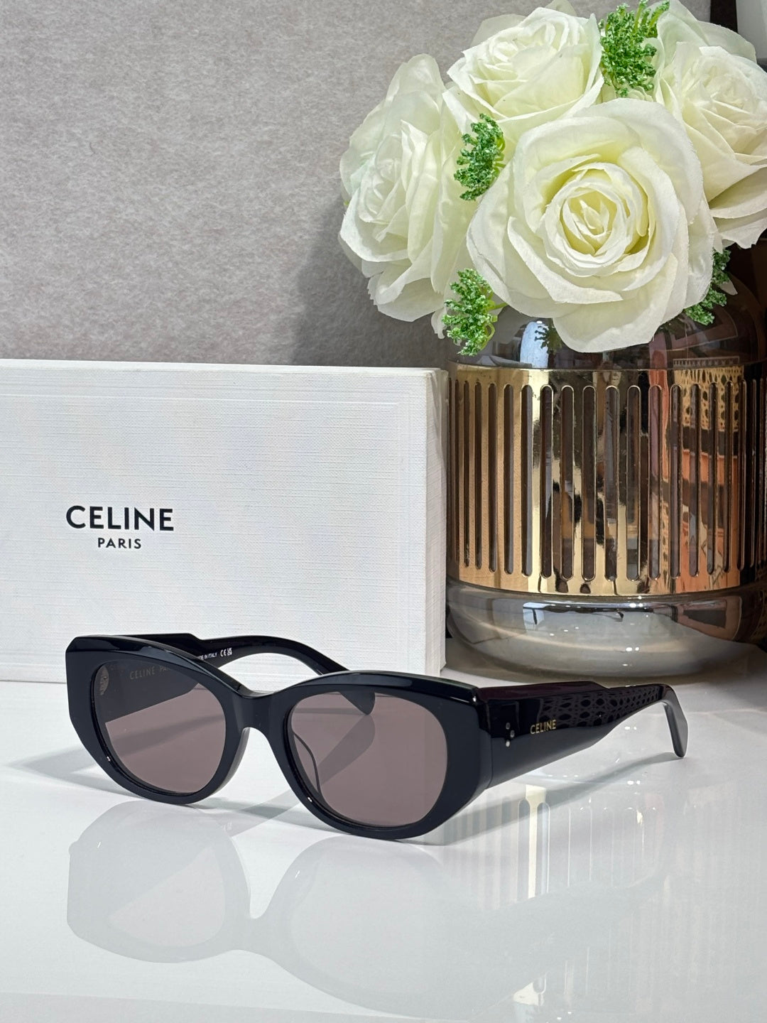Celine black sunglasses with rounded frames and dark lenses