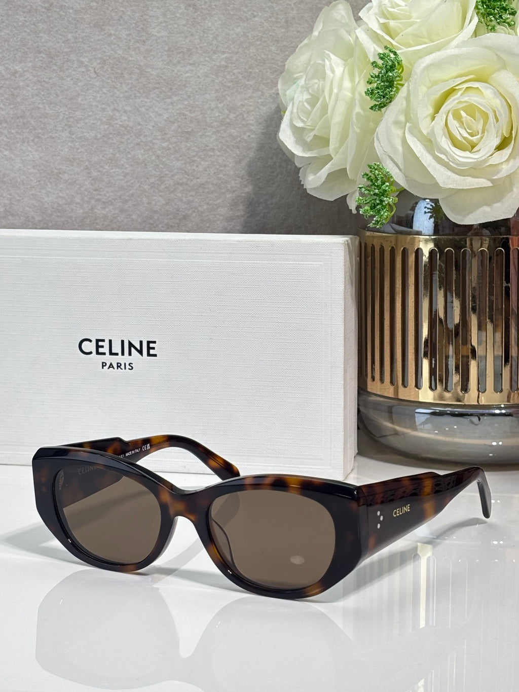 Celine tortoiseshell sunglasses with rounded frames and dark lenses