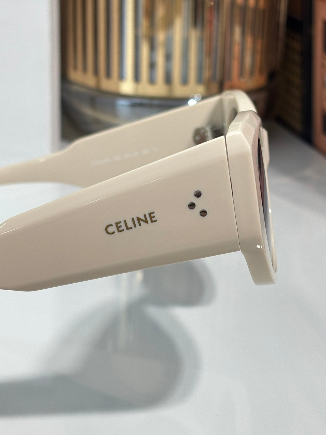 Celine cream sunglasses temple with logo and small details