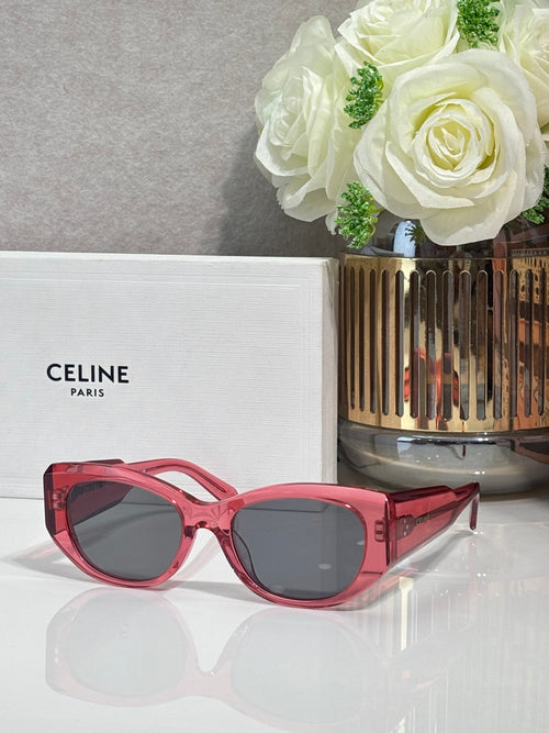 Celine pink sunglasses with rounded frames and dark lenses