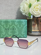 Gucci hexagon sunglasses with mauve gradient lenses and gold-tone metal frame