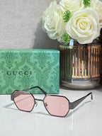 Gucci hexagon sunglasses with pink gradient lenses and gold-tone metal frame