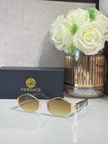 Versace octagonal sunglasses with gold-tone frames and light-tint lenses
