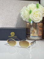 Versace octagonal sunglasses with gold-tone frames and light-tint lenses