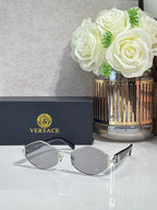 Versace octagonal sunglasses with silver-tone frames and gray-tinted lenses