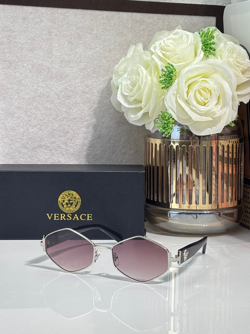 Versace octagonal sunglasses with silver-tone frames and mauve-tinted lenses