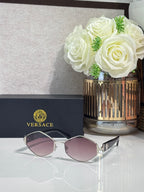 Versace octagonal sunglasses with silver-tone frames and mauve-tinted lenses