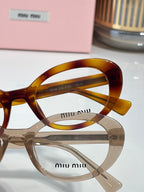 Tortoiseshell and clear eyeglasses with round optical lenses