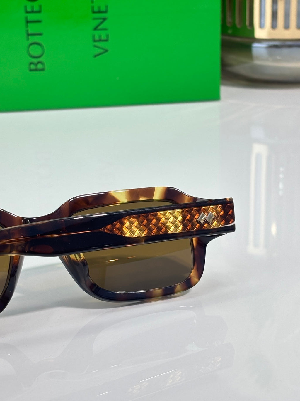 Bottega Veneta tortoise rectangular glasses with textured gold temple detail